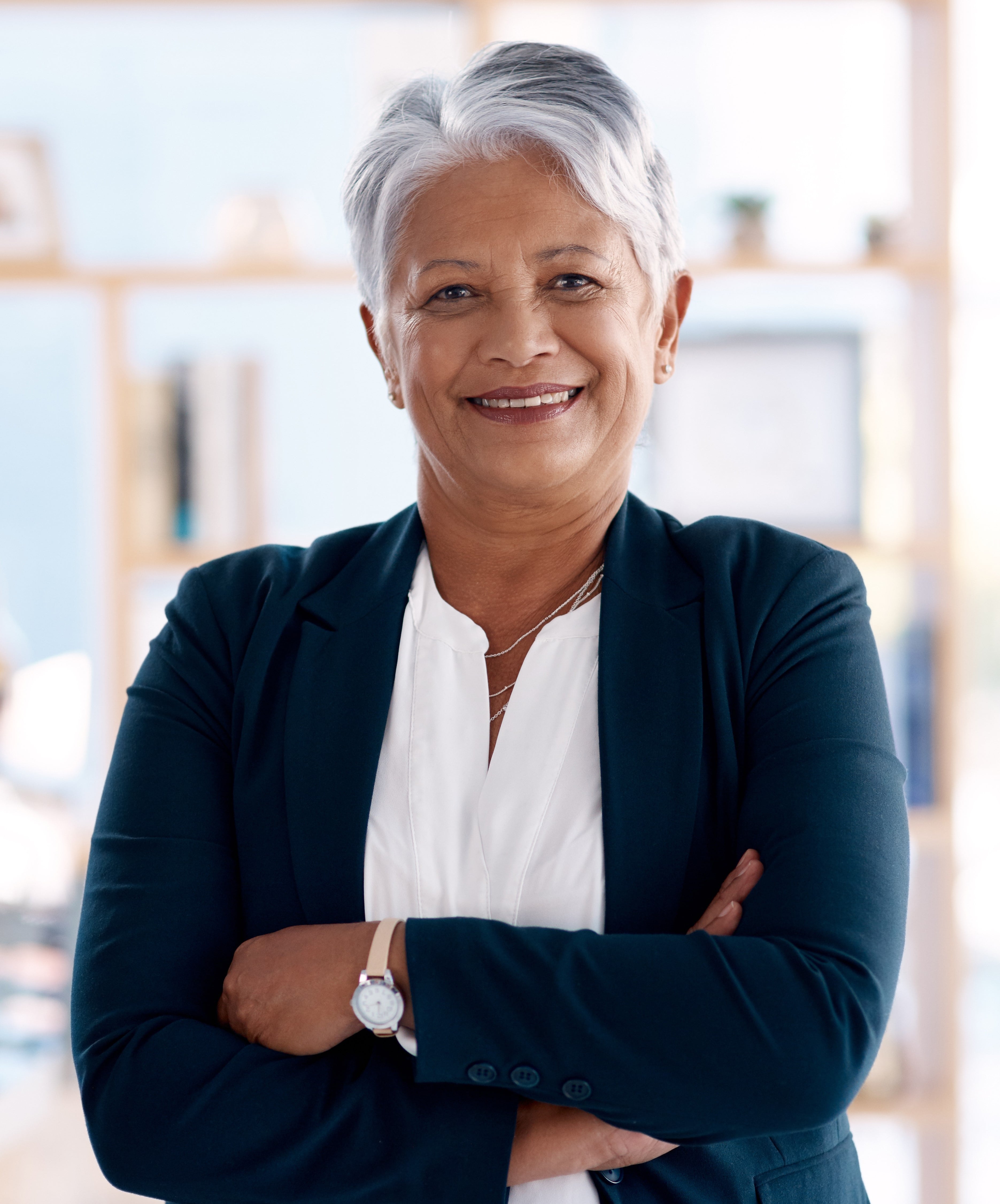 Headshot of a seasoned female executive, exemplifying leadership excellence and notable contributions in her professional journey